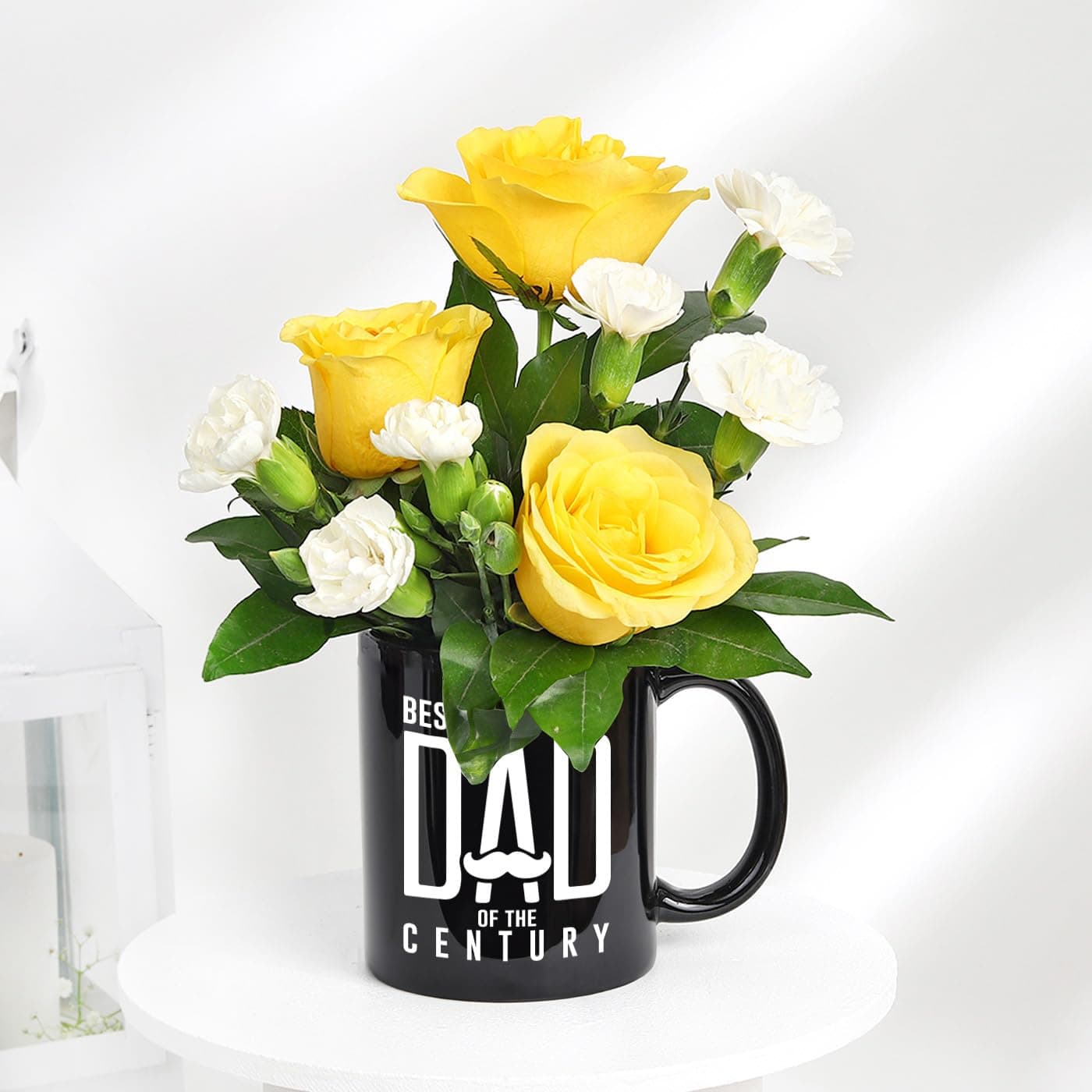 IGP - Blooming Gift Hamper with Black Ceramic Mug and RosesIspray white carnation FlowersFor Father's dayI Mothers DayI Valentine's dayI House WarmingI Party or Return Gift