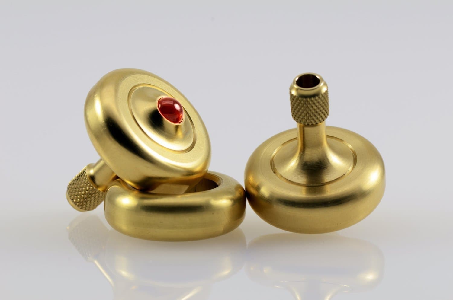 Prometheus Lights Lambda Solid Brass, Ruby Tipped Spinning Top