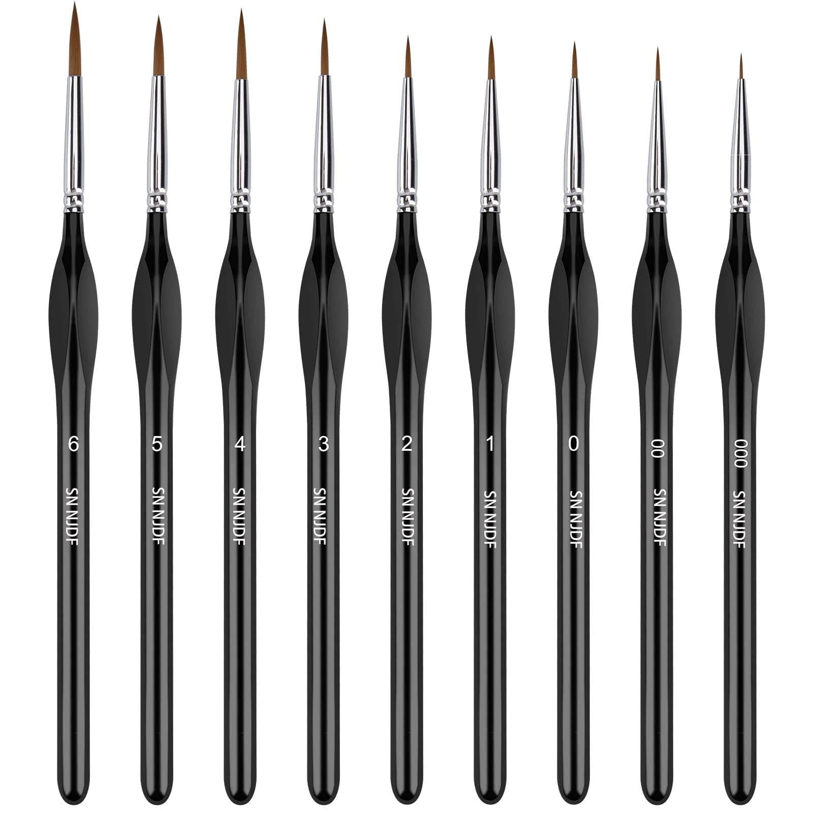 Black miniature paint brushes